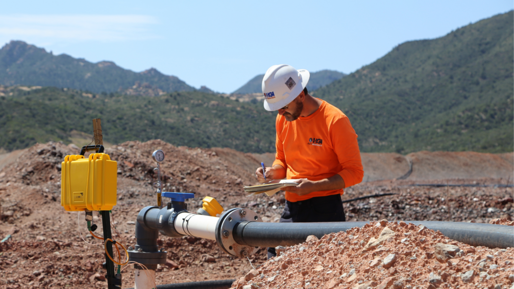 Carlotta Mine Arizona Leach Pads - man inspects pipeline
